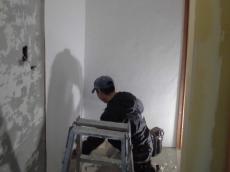 洗面所壁クロス貼り